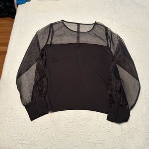 Express black top.  With top sheer and the bottom black bottom.  Size L